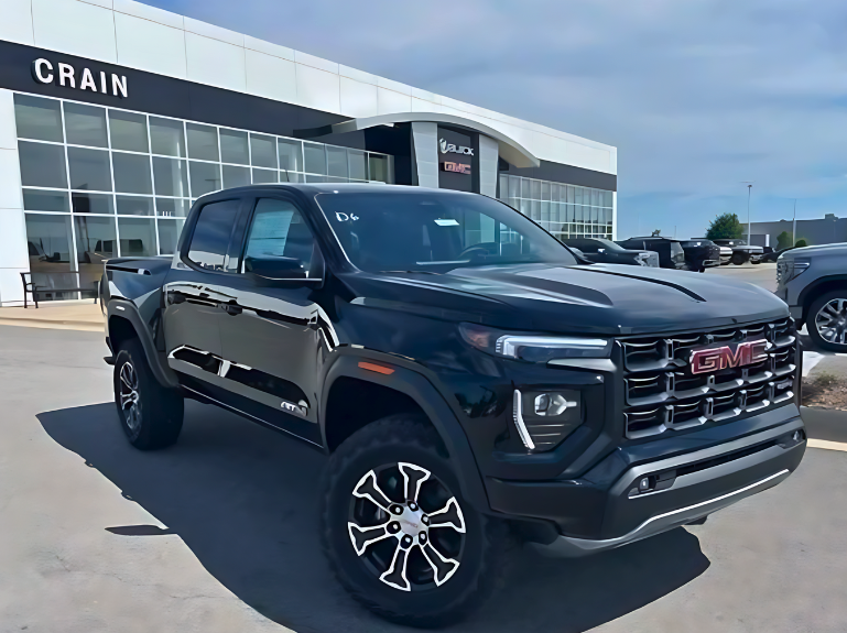 2025 GMC Canyon parked outside Crain Buick GMC in Conway, Arkansas